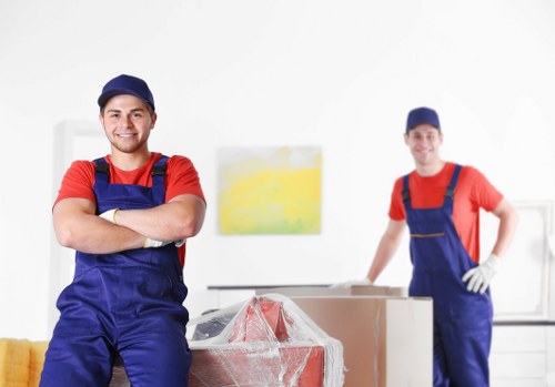 Flat removals team planning a move in Edgware apartment building