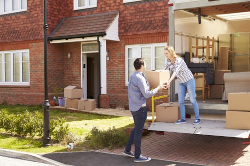 Professional house removalists planning a move in Edgware residential street