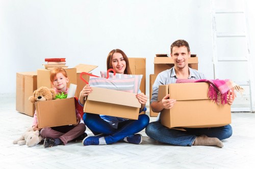 Household items being carefully loaded during a flat move in Edgware