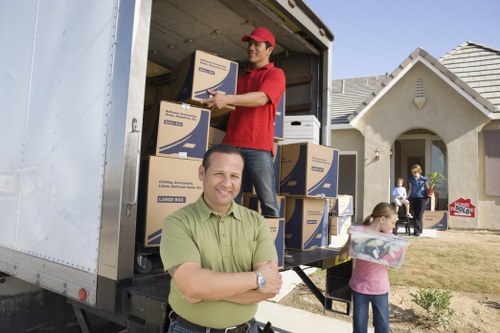 Local office moving team handling furniture and equipment in Edgware