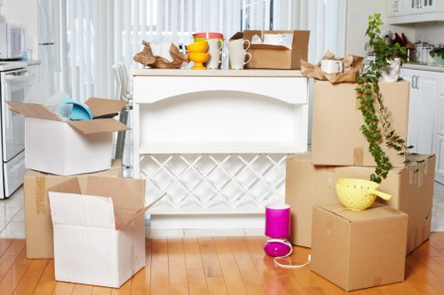 Packed boxes and furniture ready for removals in Edgware