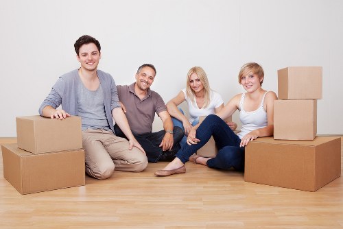 Local furniture removal team preparing items for transport
